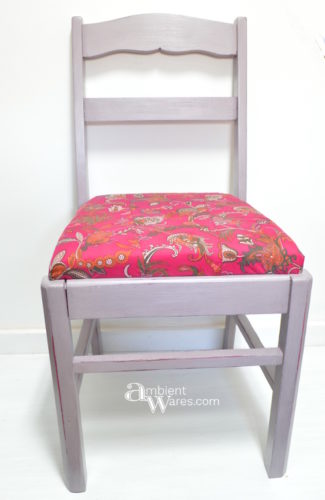 Use an old piece of clothing to recover a small piece of furniture. There are some cute clothes out there! For this and more great ideas, visit AmbientWares.com