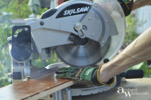 Cutting 45 degree angle of frame piece with miter saw