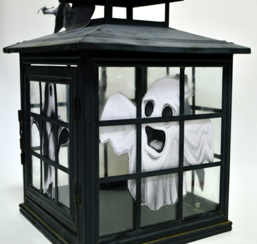 Take an Old Broken Lantern and Turn it into a Spook House! Perfect addition to your Halloween Mantle! For this and more unique ideas, visit AmbientWares.com