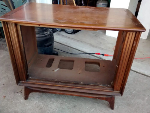 I love upcycled furniture ideas like this one! She transformed an old tube TV shell into the cutest organization station with a chalkboard as well as a shelf for added storage! For this and more unique ideas, visit AmbientWares.com