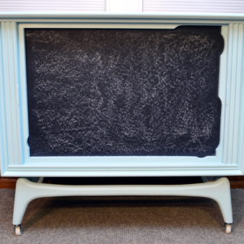 Look at this tube TV turned into a chalkboard entertainment center!