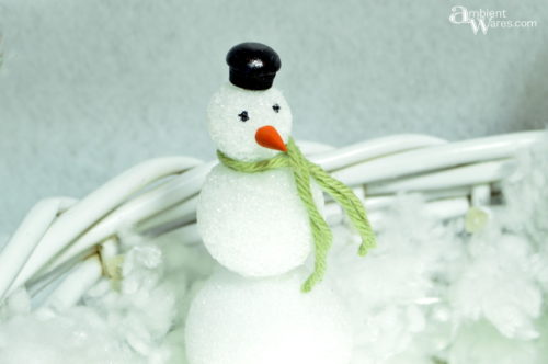 Little foam snowman in the basket made into a Winter Wonderland