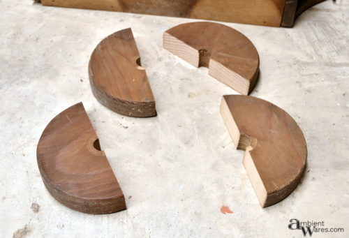 Wooden wagon wheels cut in half with the bandsaw