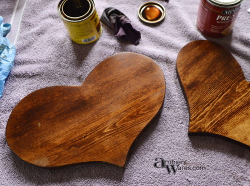 You should see what these thrift store wooden hearts look like now! A great string heART project by AmbientWares.com