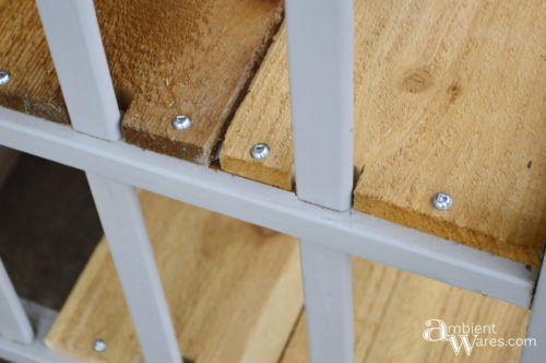 Close up of the newly added cedar fence post shelves - Changing table to potting bench - ambientwares.com