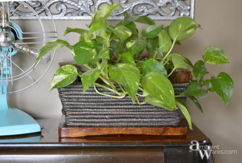 Who knew a foot stool could be flipped upside down and made into a basket?! A super easy DIY. For this and more unique project ideas, visit AmbientWares.com