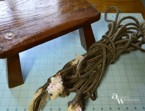 Who knew a foot stool could be flipped upside down and made into a basket?! A super easy DIY. For this and more unique project ideas, visit AmbientWares.com