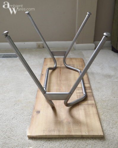 Don't throw away that disgusting plastic chair just yet. Repurpose the metal legs and DIY your own industrial style side table! For this and more unique ideas, visit AmbientWares.com