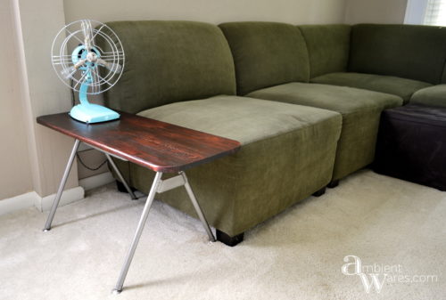 Don't throw away that disgusting plastic chair just yet. Repurpose the metal legs and DIY your own industrial style side table! For this and more unique ideas, visit AmbientWares.com