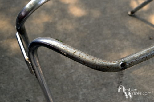 Don't throw away that disgusting plastic chair just yet. Repurpose the metal legs and DIY your own industrial style side table! For this and more unique ideas, visit AmbientWares.com