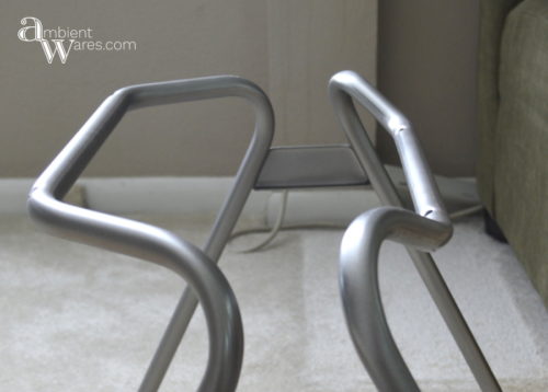 Don't throw away that disgusting plastic chair just yet. Repurpose the metal legs and DIY your own industrial style side table! For this and more unique ideas, visit AmbientWares.com