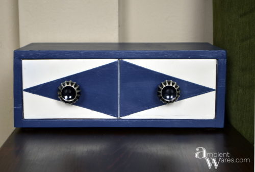 All this little 2 drawer box needed was an atomic design makeover. Here it looks like a diamond but, just switch the drawers and you have 2 triangles! It now has the perfect retro look!